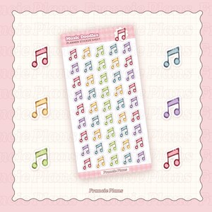 May include: A sheet of planner stickers with musical notes in a range of colours: pink, yellow, green, blue, and purple. The sheet is labelled "Music Doodles Planner Sticker Sheet."