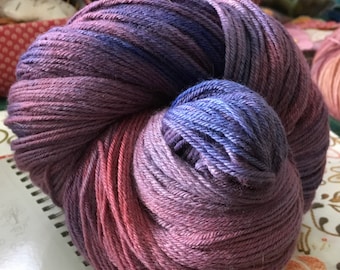 Hand dyed sock weight 100% super wash merino singles.  100g 400m