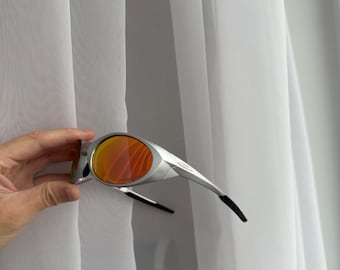 Oakley Eye jacket X occhiali da sole y2k avanguardia hype Giappone argento arancione giapponese USA raro oppio gocciolamento trapano gorpcore montagna