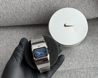The Nike D-Line Armored watch is a classic model with an innovative design, a retro-inspired accessory silver box case avantgarde y2k