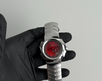 Estilo vintage retro Oakley Watch Blade hype y2k avantgarde opio gorpcore al aire libre plata japón usa acero rojo hype