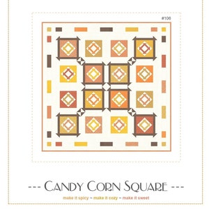 May include: A quilt pattern called "Candy Corn Square" by Thread-West, featuring a square design with a central square made of four smaller squares in orange, yellow, and brown. The pattern is surrounded by a border of smaller squares in the same colors.