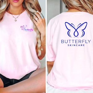 The image is a collage of two photos. In the left photo, a woman is sitting on a bed wearing a pink t-shirt with a logo and text. In the right photo, the same woman is sitting on a bed wearing a pink t-shirt with the logo and text "BUTTERFLY SKINARE" on the back.