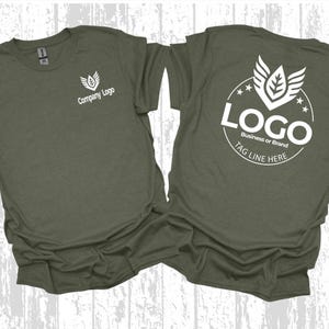 two dark green t-shirts with white text and logos on the back.