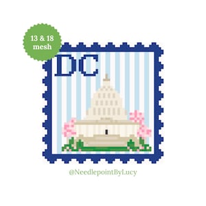 May include: A pixelated design of the U.S. Capitol building, labeled "DC", within a blue postage stamp frame. The design includes pink flowers and green foliage. The text "13 & 18 mesh" is in a green circle.