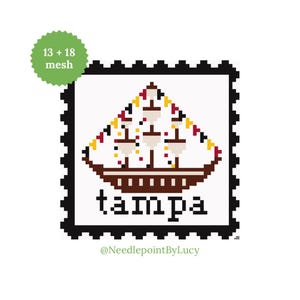May include: A pixelated design featuring a ship with white sails and a brown hull, set against a white background. The word "tampa" is written in black block letters below the ship. The image is framed by a black border, resembling a postage stamp.