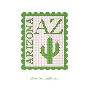 May include: A cross-stitch design of an Arizona-themed stamp. The stamp features the letters "AZ" and a green cactus with pink flowers. The word "ARIZONA" is vertically printed on the left side. The background has pink and white stripes, and the border is green.