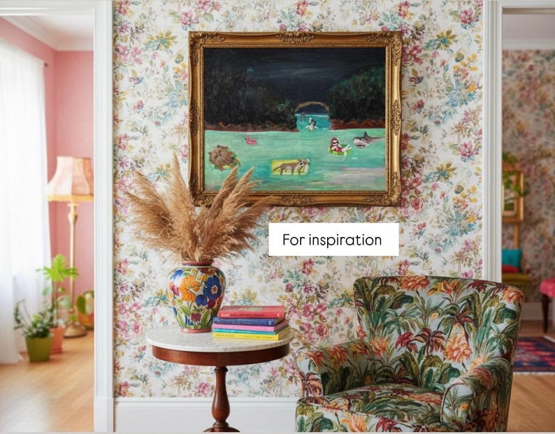 May include: A room with floral wallpaper, a framed painting, and a patterned armchair. A round table holds a vase with dried plants and a stack of books. The text "For inspiration" is visible.