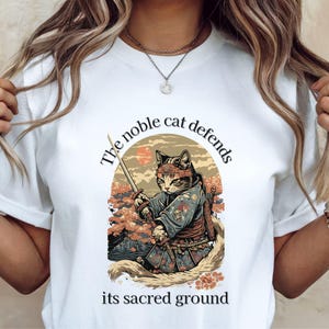 Noble Samurai Cat Tee | Warrior Feline T-Shirt | Japanese Katana Cat Art | Feudal Japan Aesthetic art | Martial Arts Cat Lover Shirt