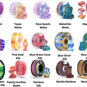 May include: Assortment of 12 spools of filament for 3D printing in various colors and finishes, including matte, silk, and gradient silk. The filament is arranged in three rows of four spools each. Each spool has a label with the name of the filament color and finish.