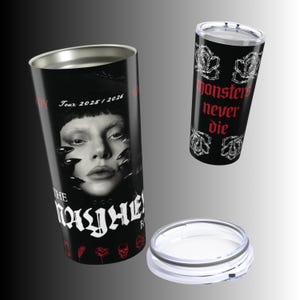 May include: Black travel tumbler with a silver rim and lid. One tumbler features a black and white image of a person with the text "THE MAYHEM" and "Tour 2025/2026". The other tumbler has the text "Monsters never die" in red.