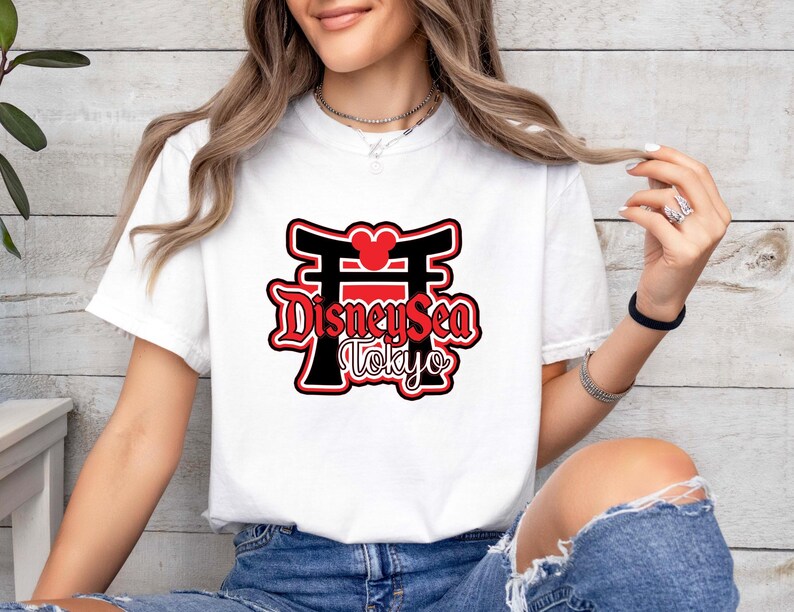 Experience the magic of Tokyo DisneySea in comfort and style with this vintage-inspired Comfort Colors® tee! Perfect for Disney family vacations or group trips, this soft and durable shirt makes a fun and memorable matching outfit. Whether you're walking the park or capturing group photos, this tee celebrates your Tokyo DisneySea adventure in a colorful and comfy way!