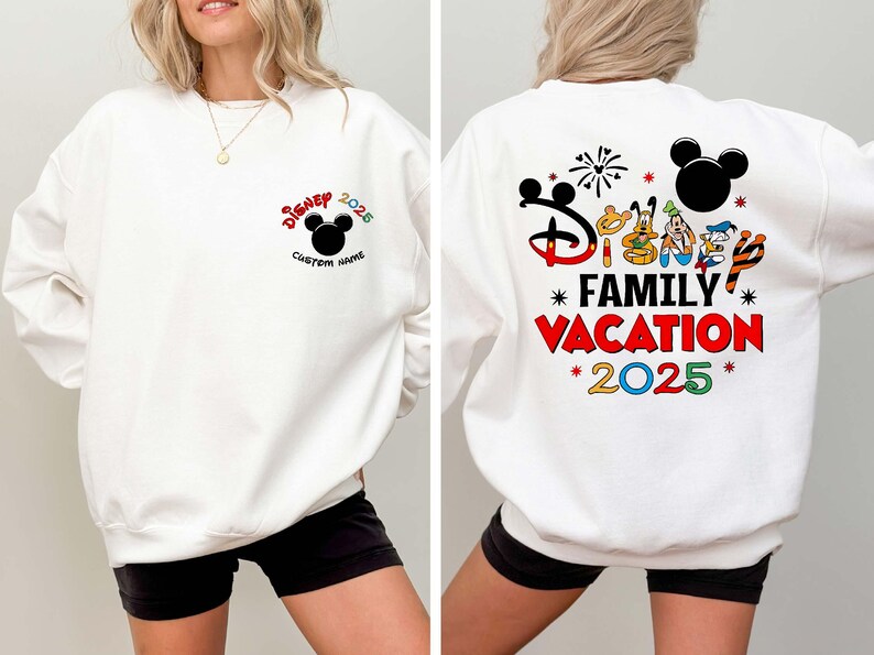 May include: White sweatshirt with a Disney theme. The front features the Disney logo, Mickey Mouse ears, the year 2025, and space for a custom name. The back displays the words "Family Vacation 2025" with Disney character graphics.