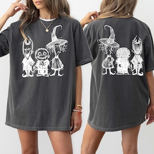 Celebrate spooky season with this Nightmare Before Christmas Shirt featuring Barrel, Lock, Shock, and Oogie Boogie. Perfect for Halloween parties, horror movie nights, or themed Disney events. A must-have tee for fans of Tim Burton’s classic Halloween-Christmas crossover film, offering a fun and festive way to show your spooky style.