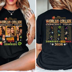 May include: A black t-shirt featuring a Disney Descendants Worlds Collide Concert Tour graphic. The front displays character portraits and logos for Camp Rock and Zombies. The back lists tour cities, dates, and logos for Zombies and Camp Rock 2026.