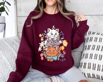 Sudadera vintage de Los Aristogatos de los años 70 con gatos de Disney y diseño floral.