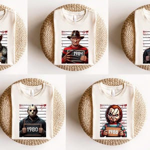 This Horror Killers Squad Shirt features iconic horror movie villains in a spooky, bold design. Perfect for Halloween parties, horror marathons, or fans of slasher films. Printed on soft Comfort Colors® fabric, it offers vintage style and lasting comfort. A great choice for horror lovers who want to celebrate spooky season with eerie flair and scary movie vibes.
