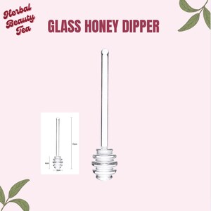 May include: A clear glass honey dipper with a long handle and a rounded bottom. The dipper is 15 inches long and has a 2-inch diameter at the bottom.