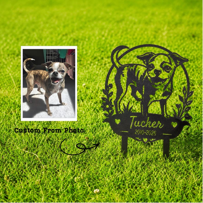 May include: A black metal garden stake featuring a dog silhouette, with the name "Tucker" and dates "2010-2026" inscribed. A photo of a dog is in the upper left corner. The text "Custom From Photo" is below the photo.