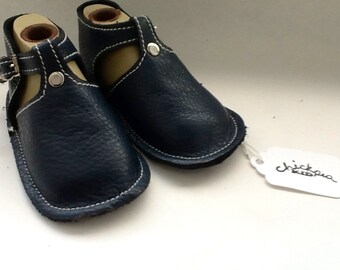 Navy leather baby shoe with buckle and rivet