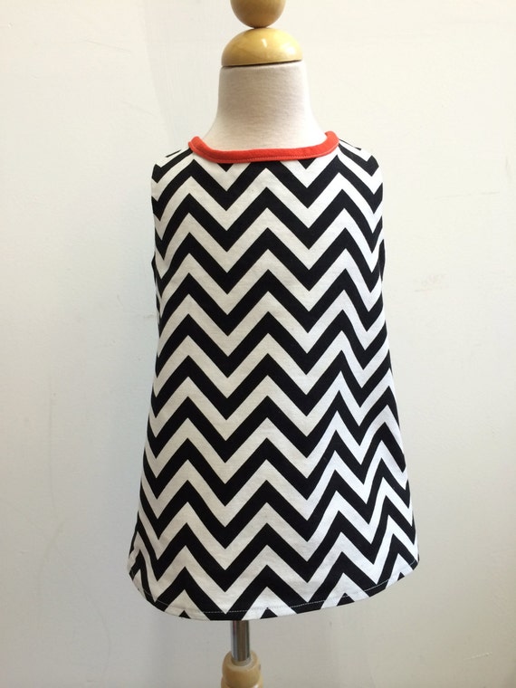 Black and White chevron print A line dress with orange piping