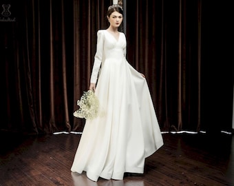 modest empire waist wedding dresses Cape Detailed Pearl Embroidered Empire Waist Wedding Dress