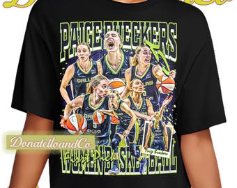 May include: Black t-shirt with a graphic of a women's basketball team, the text "Paige Bueckers" and "Women's Basketball". The design shows players in action, holding basketballs, and wearing blue and white uniforms.