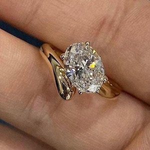 Unique Wave Wedding Band, 2.00 CT Oval Cut Colorless Moissanite Engagement Ring, 14K Yellow Gold Stacking Band Ring, Solitaire Bypass Ring