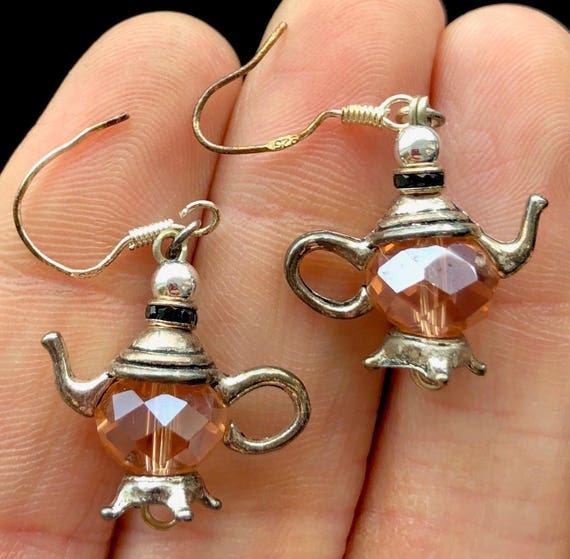 Vintage sterling silver + crystal teapot dangle earrings that are literally one-of-a-kind — the kind of wearable miniature sculpture you can't find anywhere else.