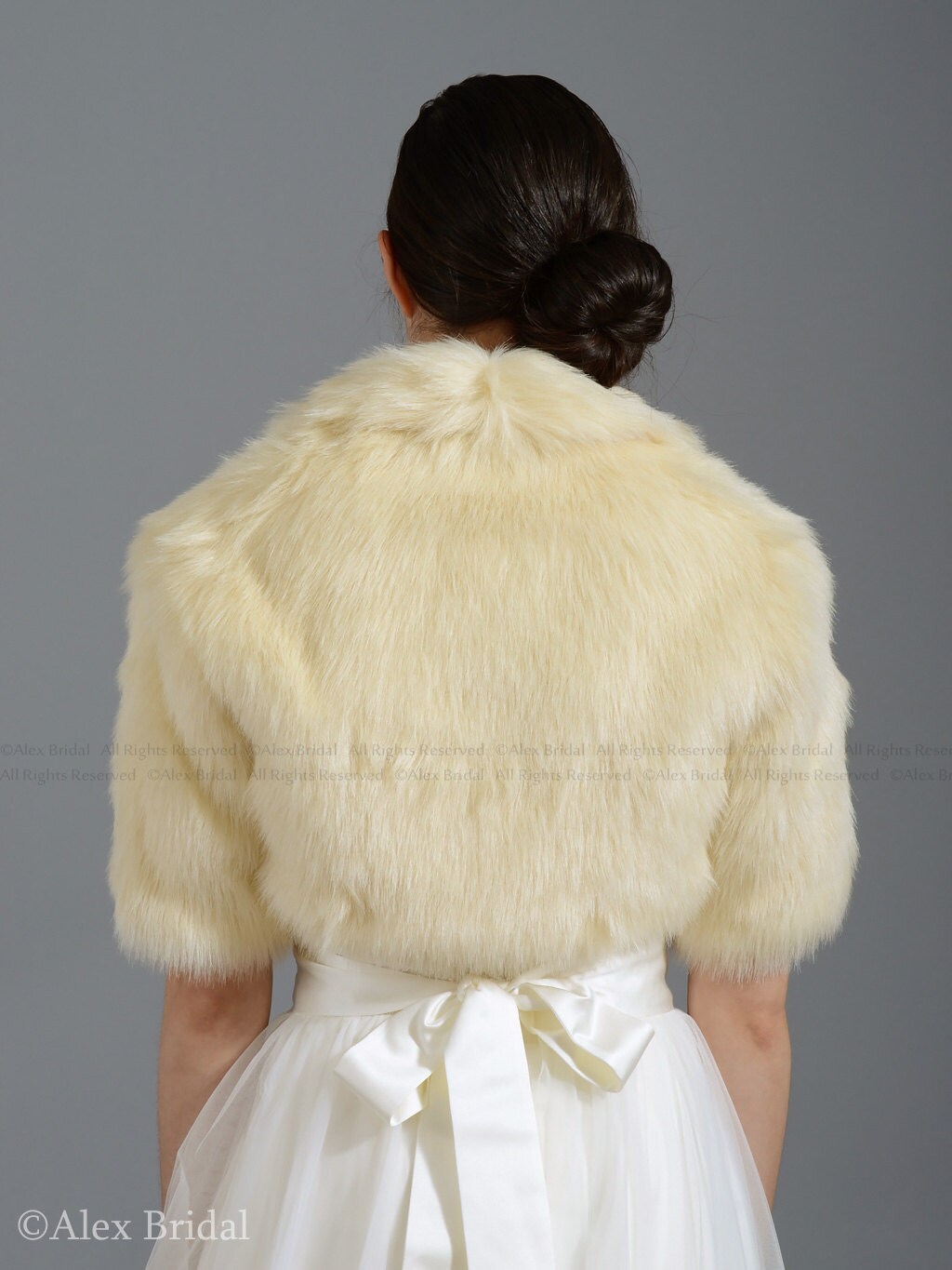 type of sweater made from thick undyed wool
