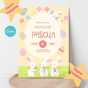 May include: Easter invitation template with a light yellow background. The design features white bunnies holding carrots, colorful Easter eggs, and the text "Fiesta de Pascua". The date is April 6th.