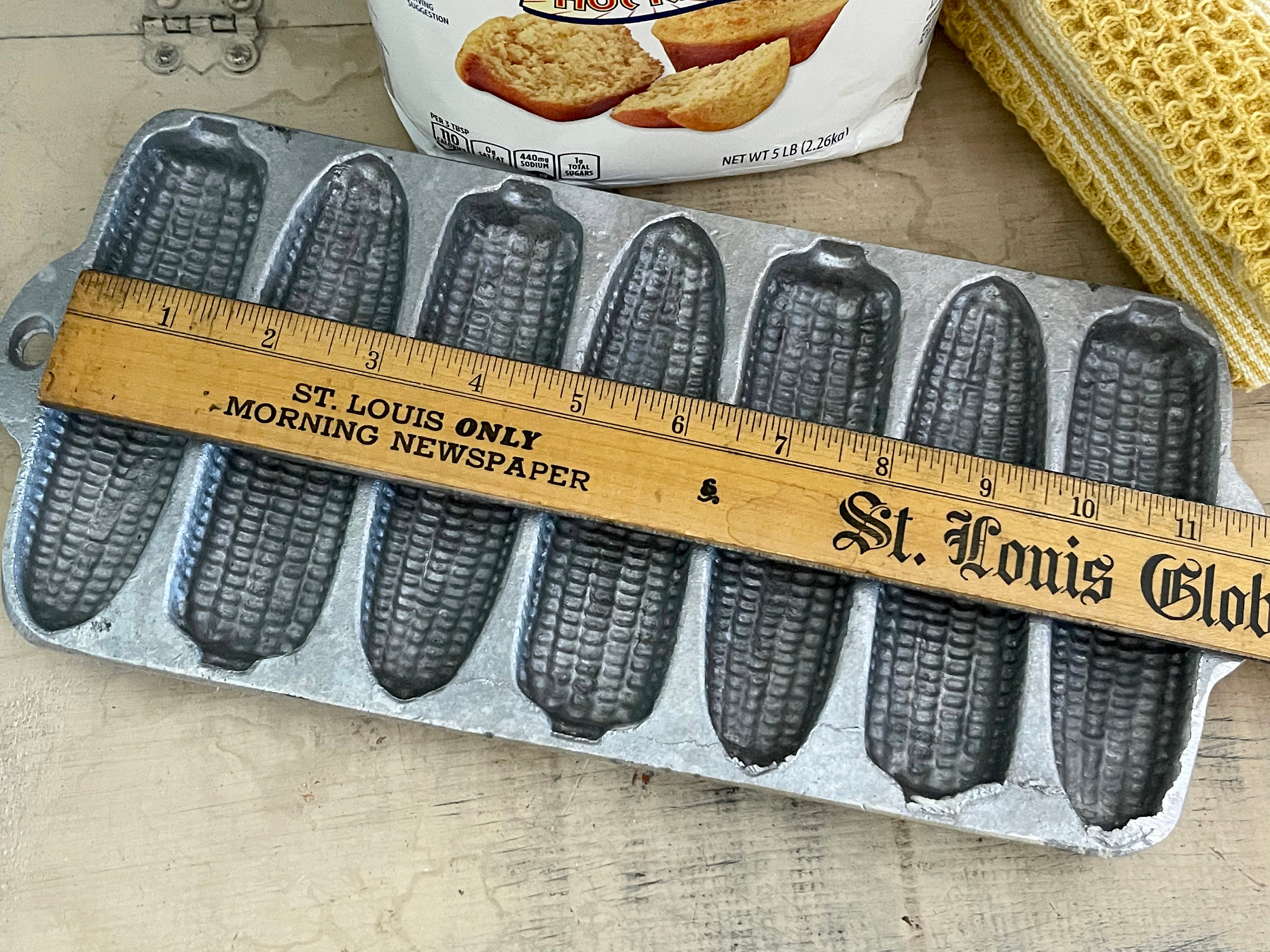 vintage cast iron cornbread pan for corn stick muffins, ears of corn mold