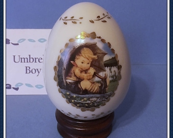 M.J. Hummel Porcelain Egg, Umbrella Boy, Stand, COA, 23 kt Gold Accent, The Danbury Mint, Vintage 1994