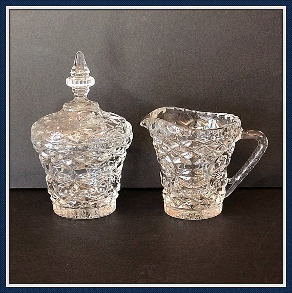 Vintage Clear PRESSED GLASS Sugar Bowl and Creamer in A Diamond Pattern with Sunburst on the Bottom  1950s  E