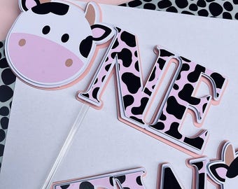 Cow print cake topper