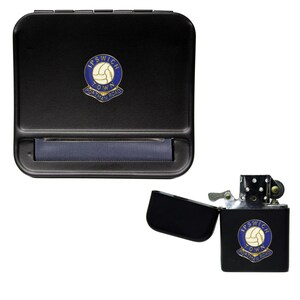 May include: Black rolling tray and lighter with the Ipswich Town Football Club logo. The logo is blue and white with a soccer ball and the words "Ipswich Town" and "Portman Road".