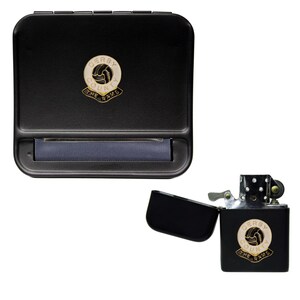May include: Black rolling tray and lighter with a white and gold Derby County Rams logo. The logo features a football and the words "Derby County" and "The Rams".