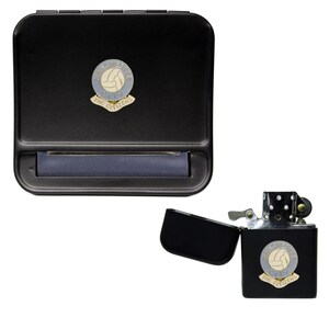 May include: Black rolling tray and lighter with a Manchester City Football Club logo. The logo is silver with a gold outline and features a soccer ball and the words "Manchester City" and "The Citizens".