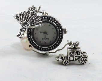 Tiny table clock to fit any nook and please romantic with fan and old car charms on repurposed watchface and pretty pink bead.