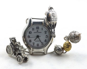 Miniature clock to fit any nook in a nostalgic way with its old car, floating balloon and fancy old-fashioned beads and silver clockface.