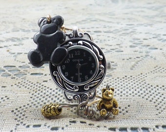 Miniature clock to fit any nook or be a gift for someone who loves teddy bears, with two bear charms and a retro, black/silver clock