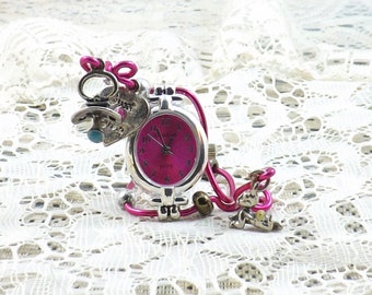 Hot pink Geneva Elite mini clock featuring silver baby charm and pacifier plus heart with "Sweet Thing" on it, to please any new parent.