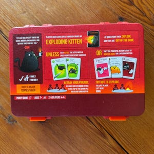 Custom 3D-printed storage box for Exploding Kittens. Holds cards securely with a built-in divider, doubles as a deck and discard holder. UV-printed artwork ensures crisp, vibrant designs. Perfect for organising and upgrading your game night setup.