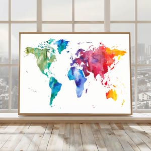 May include: A framed watercolour world map, depicting continents in vivid shades of blue, green, red, and yellow. The artwork is set against a white backdrop, within a wooden frame. This map is a decorative item, ideal for home or office decoration.