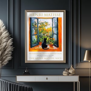 May include: A vintage poster advertising an exhibition of Henri Matisse's work at the Musee Matisse in Nice, France. The poster features a painting of a black cat sitting in a windowsill with a view of a garden.
