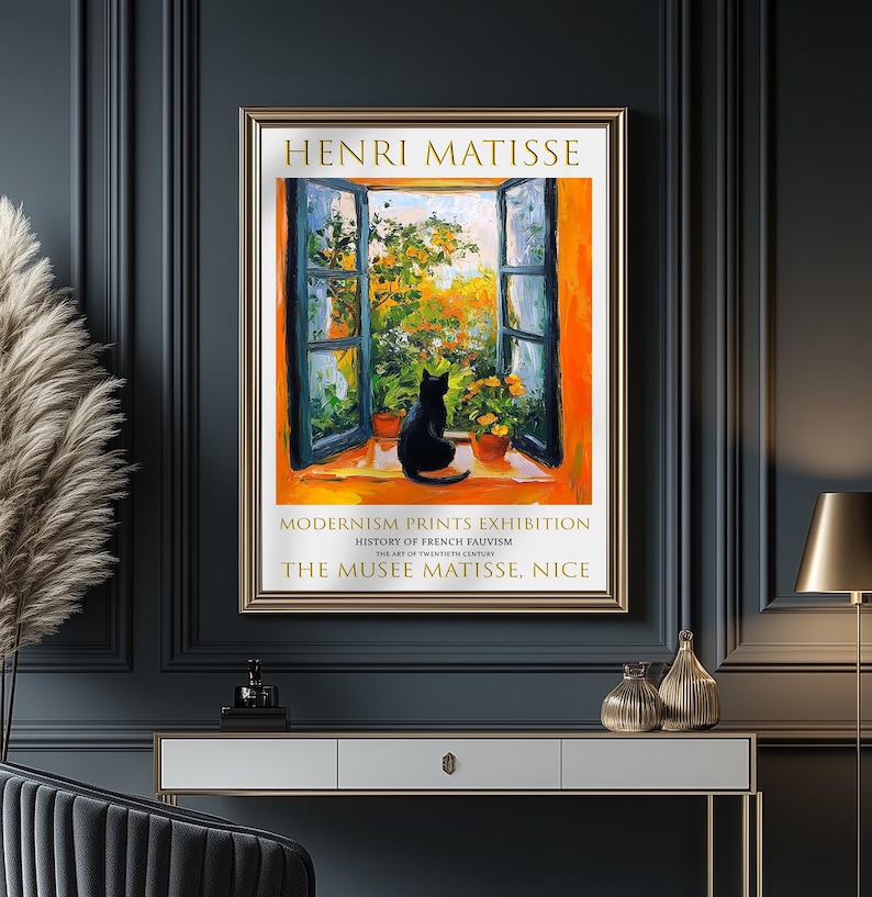 May include: A vintage poster advertising an exhibition of Henri Matisse's work at the Musee Matisse in Nice, France. The poster features a painting of a black cat sitting in a windowsill with a view of a garden.
