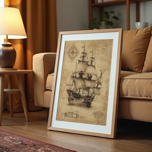 May include: A framed print of a detailed black and white drawing of a sailing ship. The ship is depicted with its sails unfurled and is surrounded by nautical charts and diagrams.