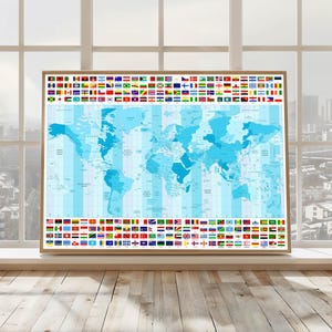 May include: A framed world map in light blue, showing continents and time zones. Rows of national flags border the top and bottom. The map is set against a window with a cityscape view and wooden flooring.