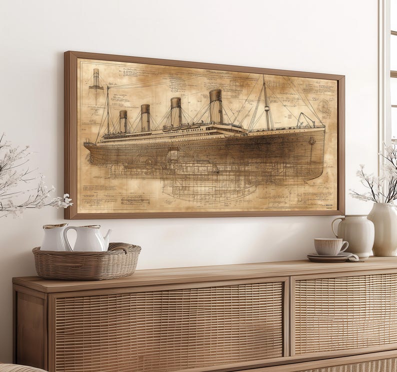May include: A framed print of a vintage blueprint of the RMS Titanic, a large passenger liner that sank in the North Atlantic Ocean in 1912.