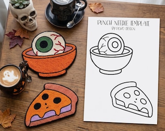 May include: A punch needle template sheet with the text PUNCH NEEDLE TEMPLATE BY POKO DESIGN, featuring line drawings of an eyeball in a bowl and a slice of pizza. Beside it are two finished punch needle coasters matching these designs.